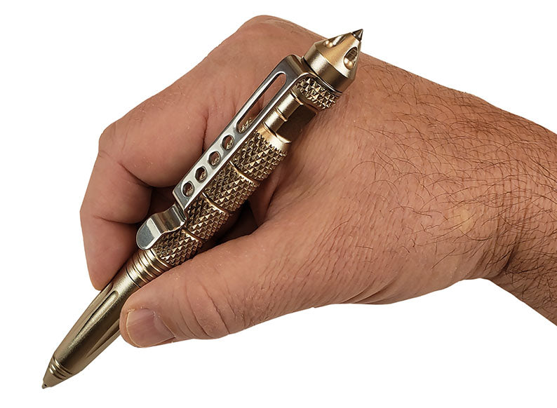 close up in hand of emergency tactical pen pocket multitool everyday carry for emergency preparedness